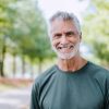 Portrait of a senior man on a workout in the public park